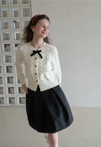 Elegant Cable Knit Cardigan with Bow Detail