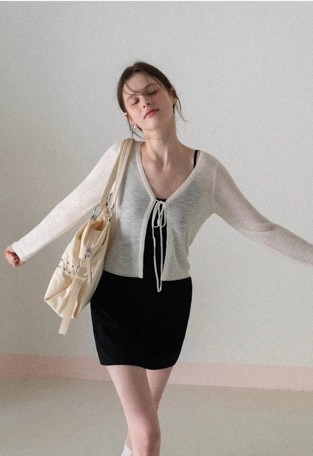 Sleeveless fitted mini dress with thin straps