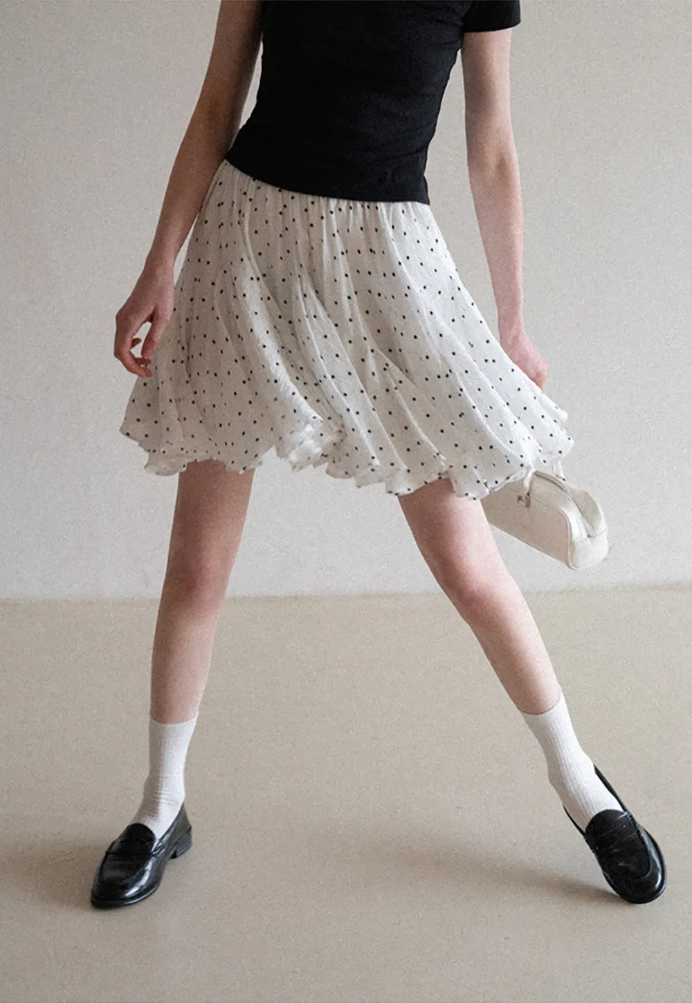 Polka dot pleated skirt with elastic waistband