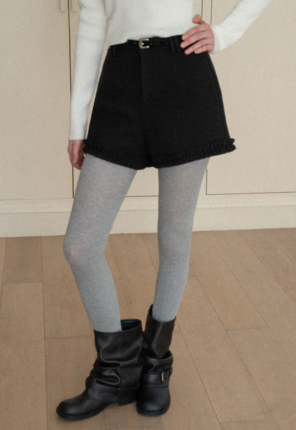 High waist shorts with ruffle hem and belt design