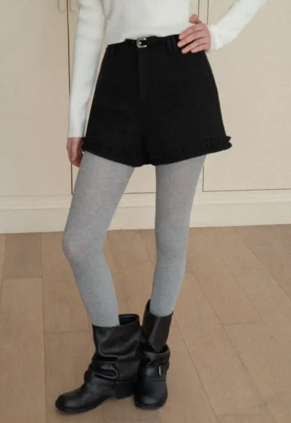 High waist shorts with ruffle hem and belt design