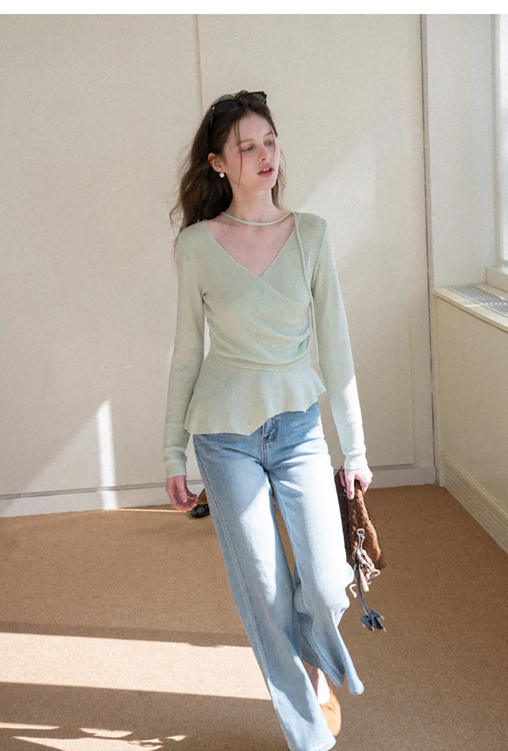 Long sleeve wrap knit sweater with ruched detail