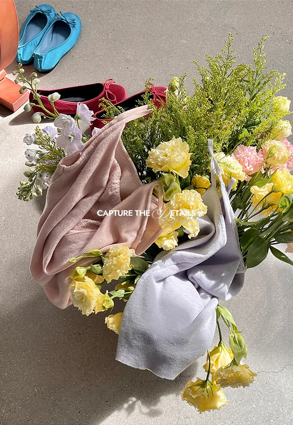 Silk-like tank top with thin straps and draped neckline