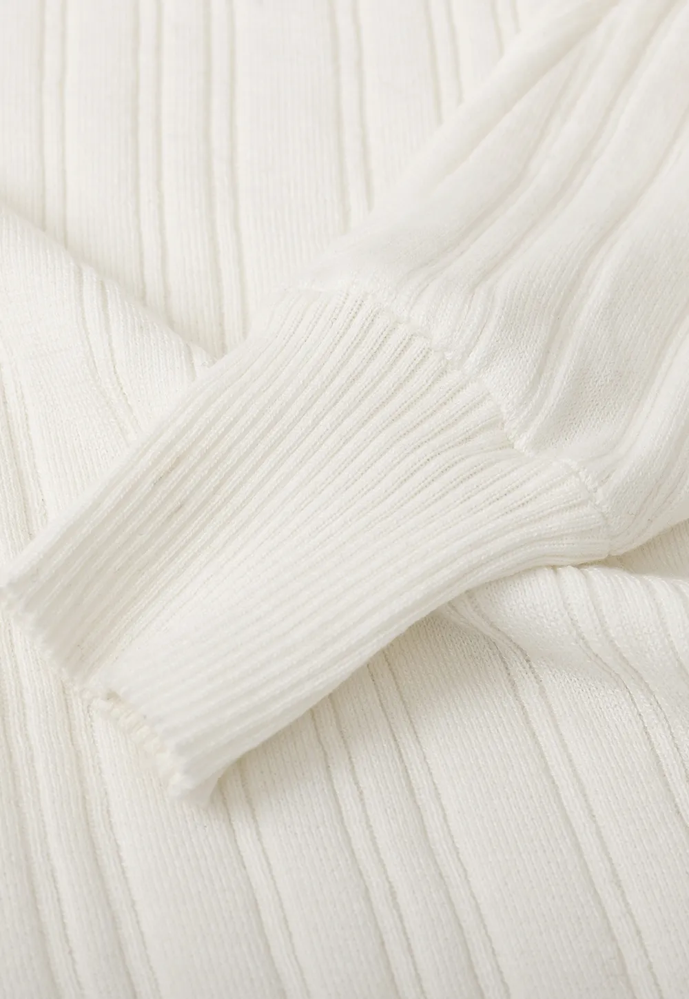 Ribbed knit sweater with wide neckline and long sleeves