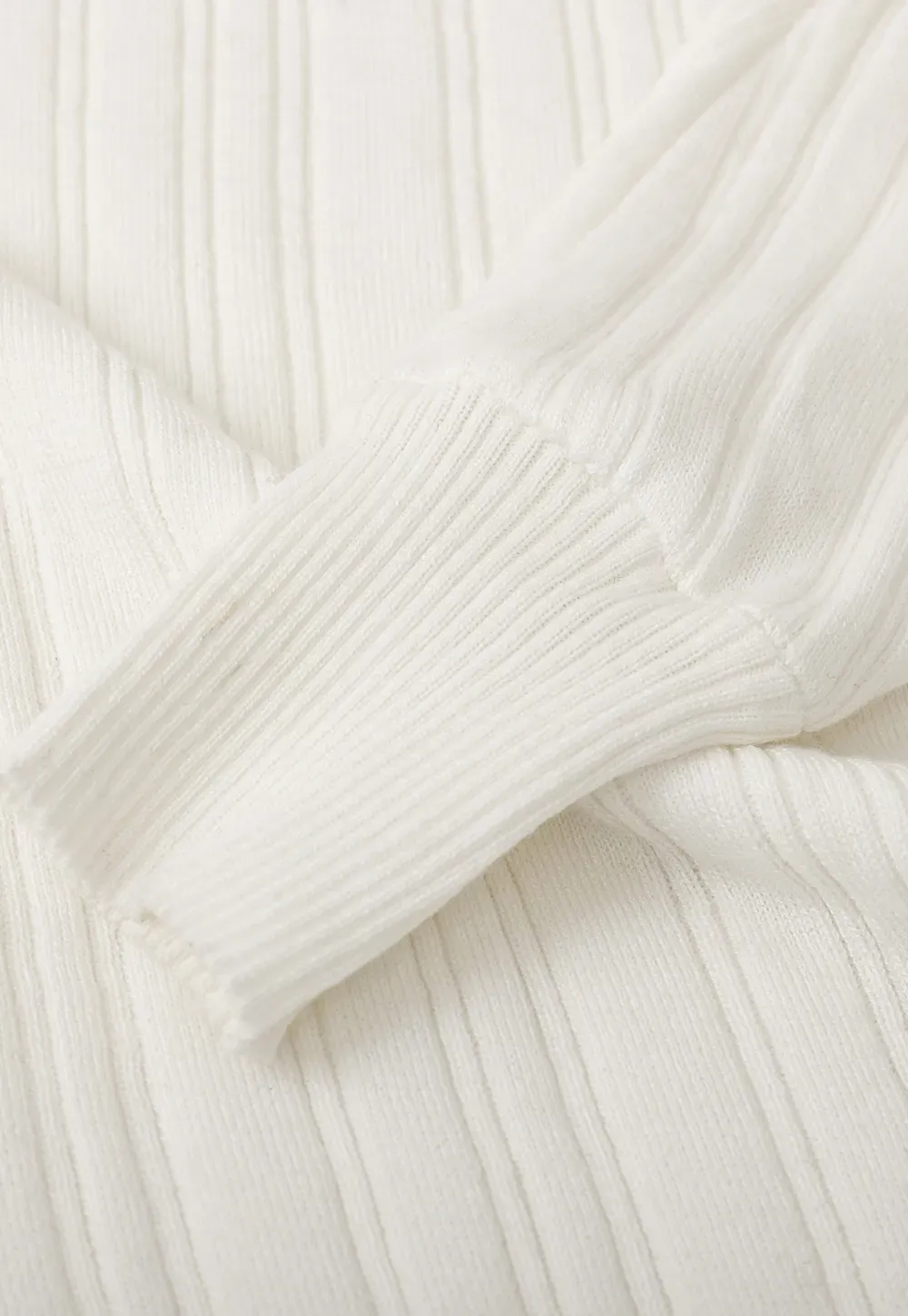 Ribbed knit sweater with wide neckline and long sleeves