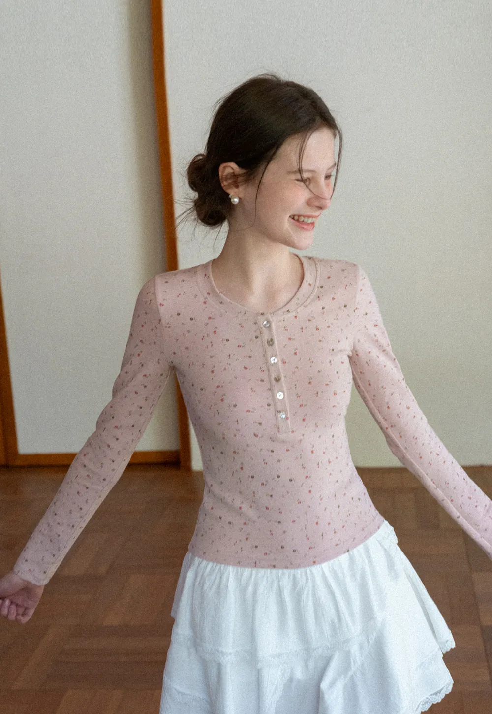 Long sleeve button front top with floral print