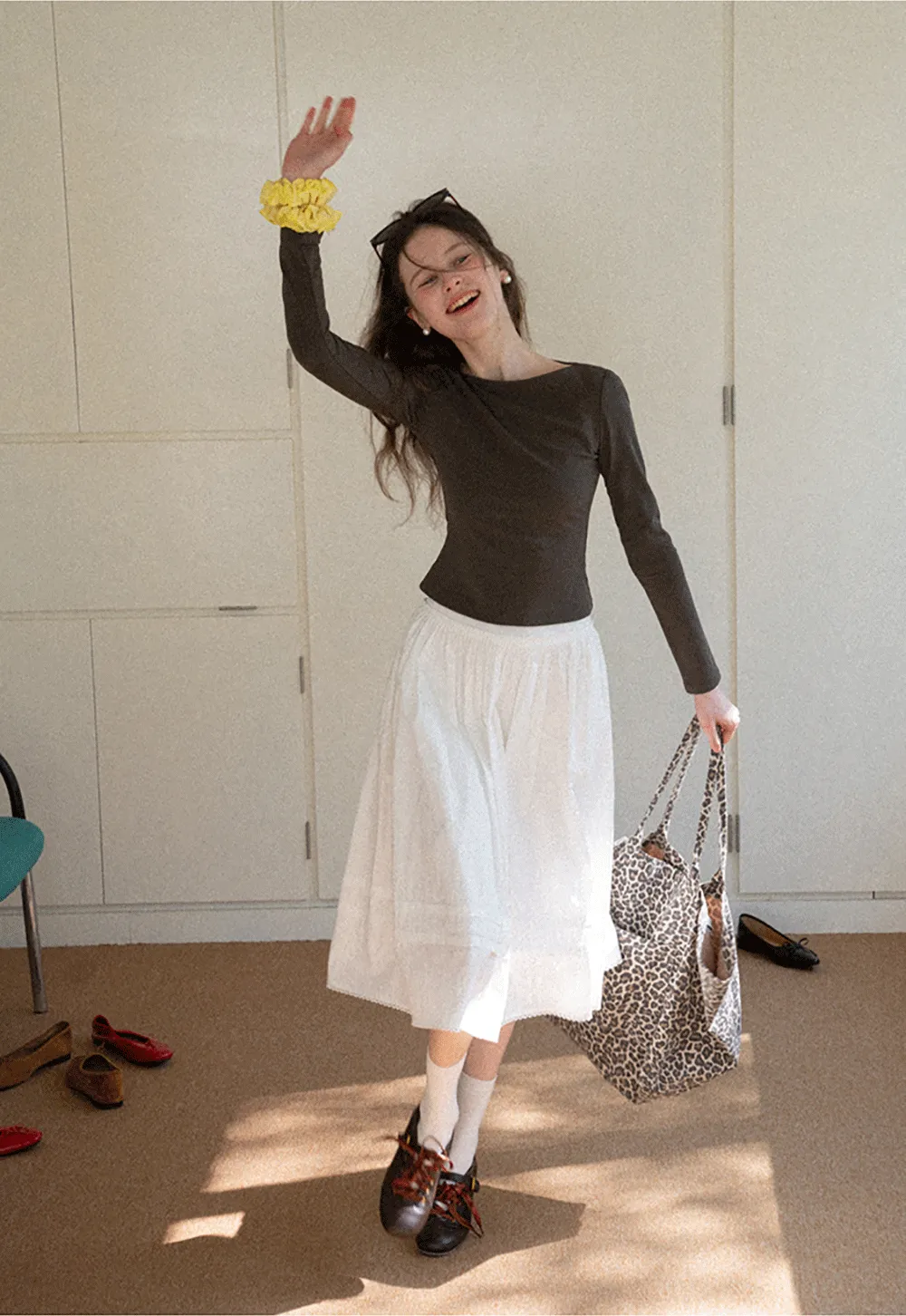 Lightweight pleated midi skirt with elastic waist