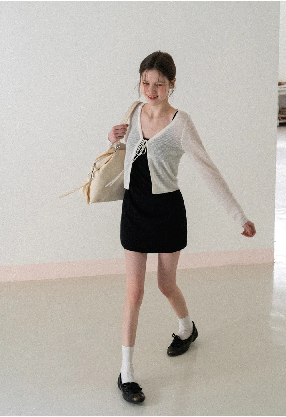 Sleeveless fitted mini dress with thin straps