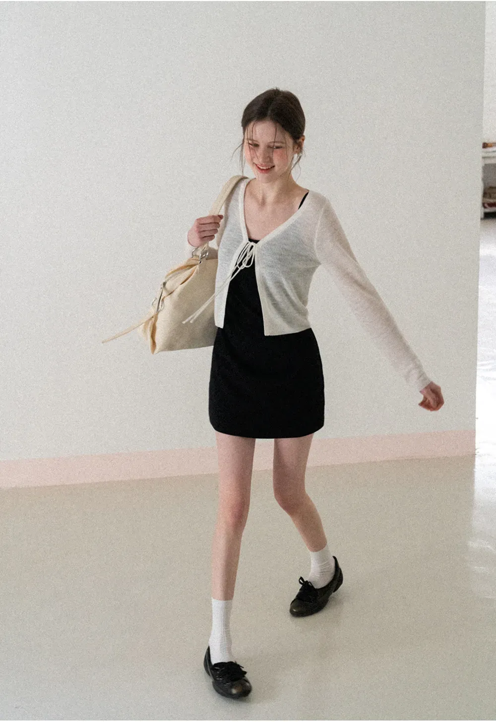 Sleeveless fitted mini dress with thin straps