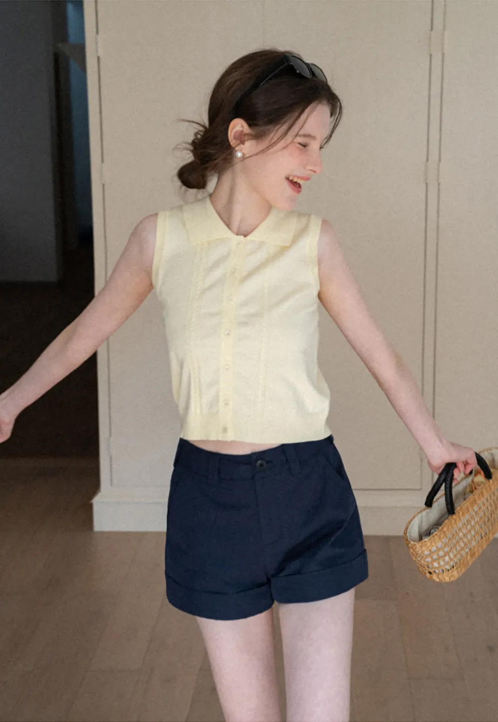 Sleeveless Knit Top with Collar and Buttons