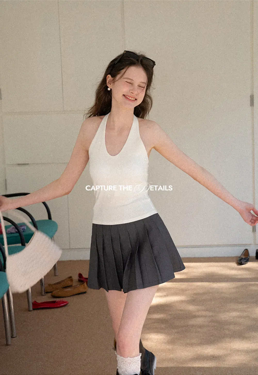 Pleated skirt with high waist and flared hem