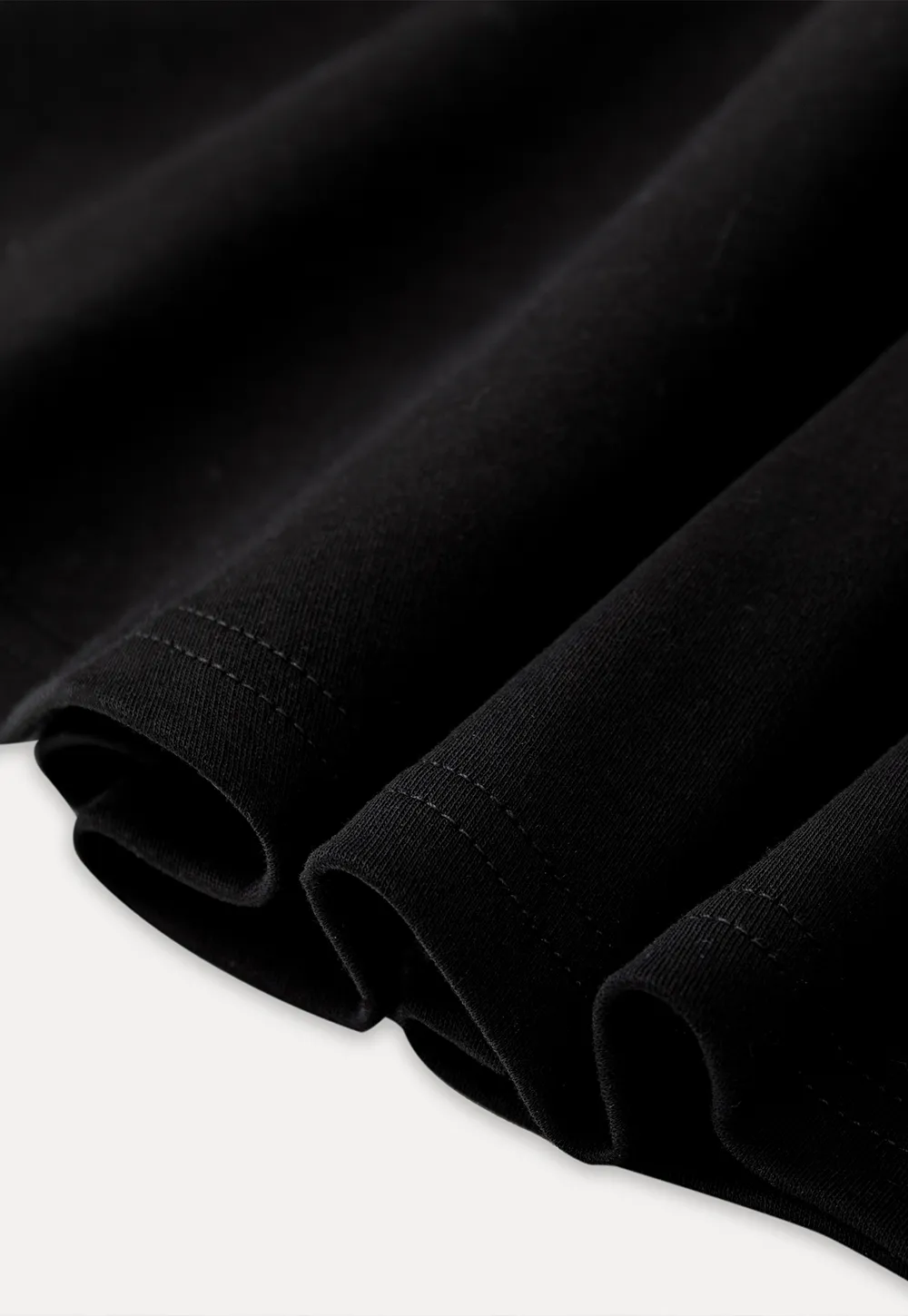 Sleeveless dress with thin straps and flared skirt