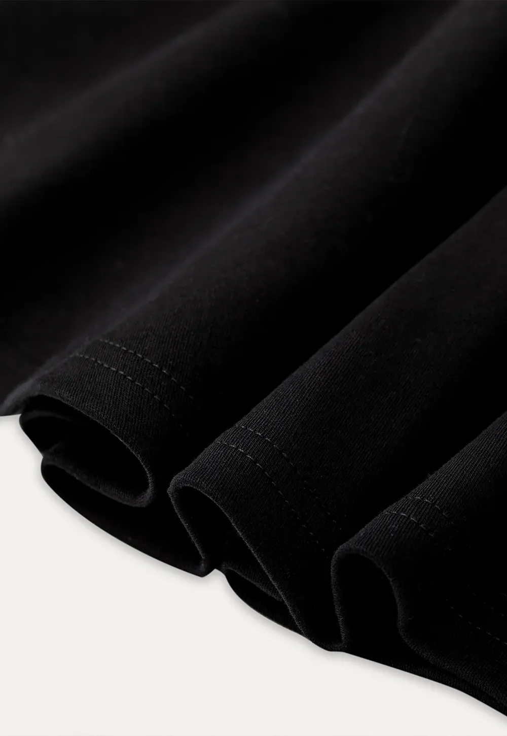 Sleeveless dress with thin straps and flared skirt