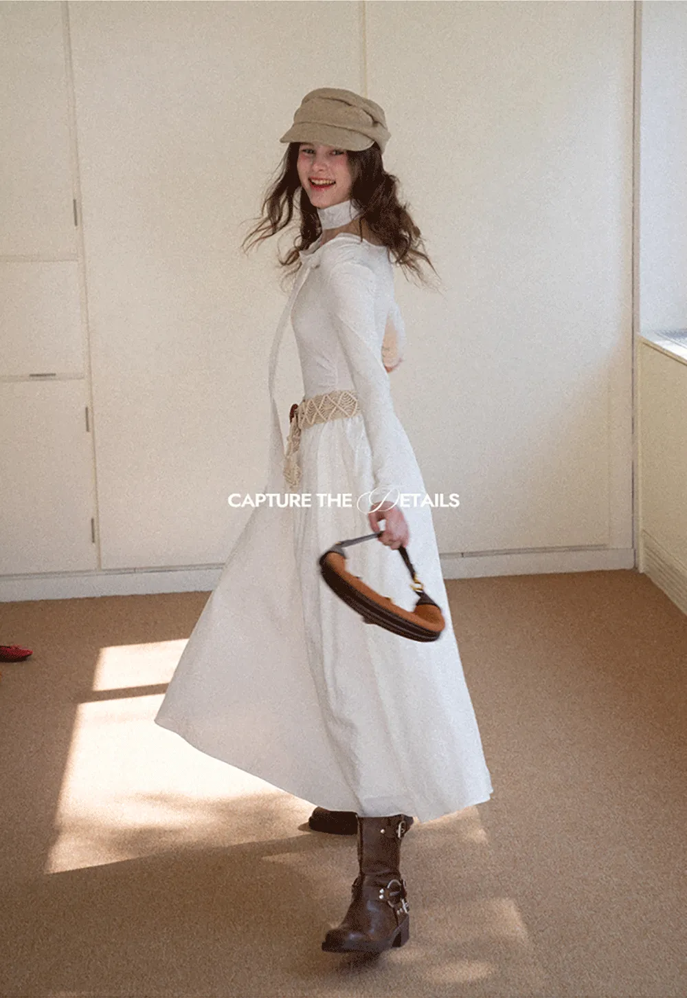 Elegant asymmetrical long sleeve dress with unique belt design