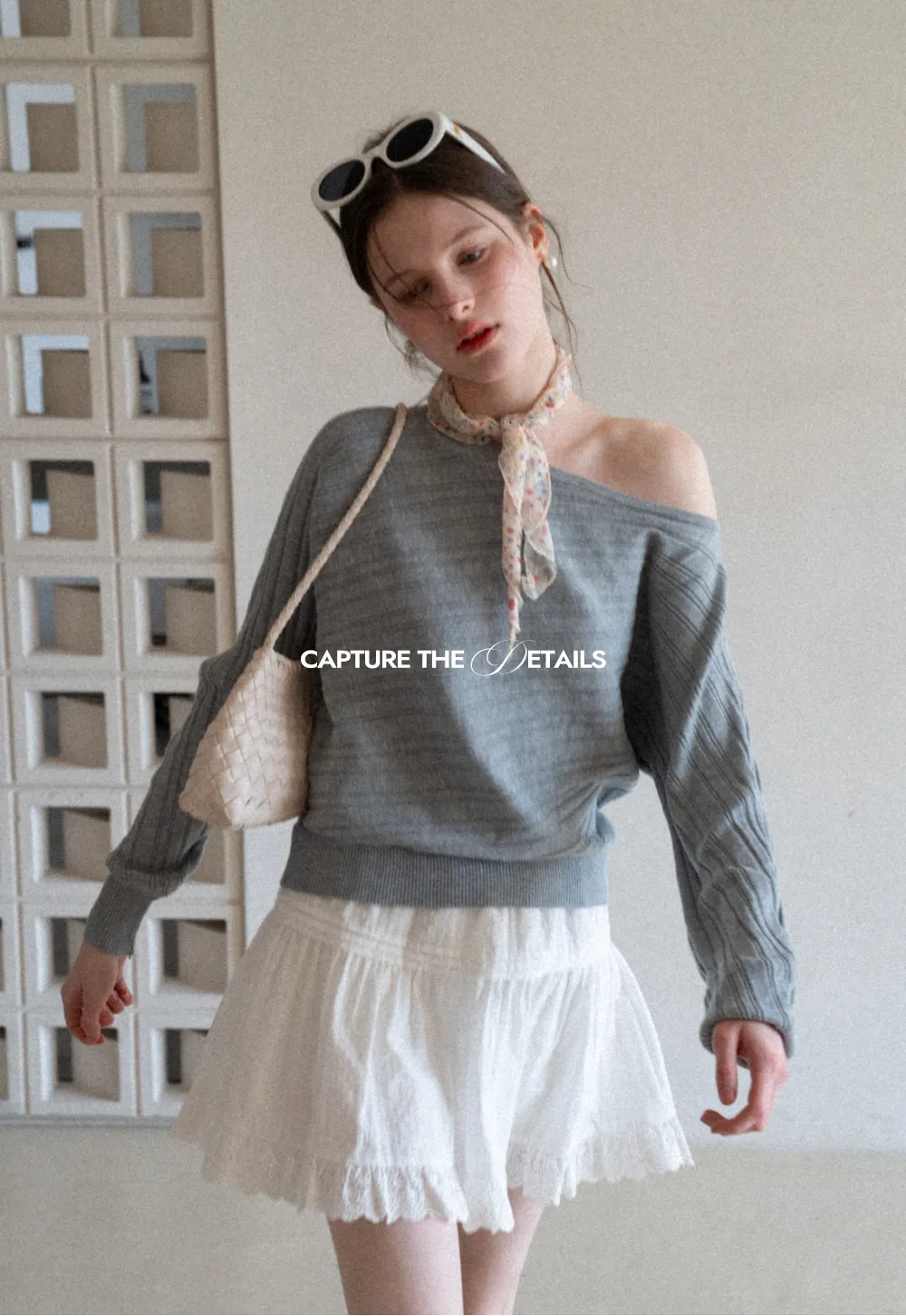 Ribbed knit sweater with wide neckline and long sleeves