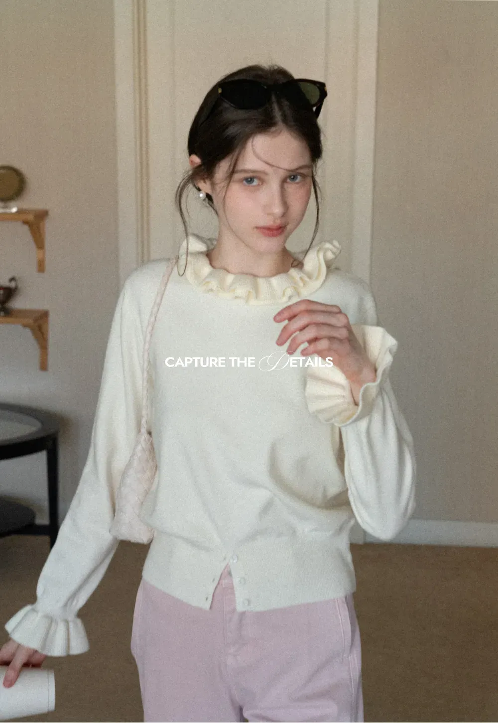 Elegant Ruffle Detail Knit Sweater with Flared Cuffs and Neckline