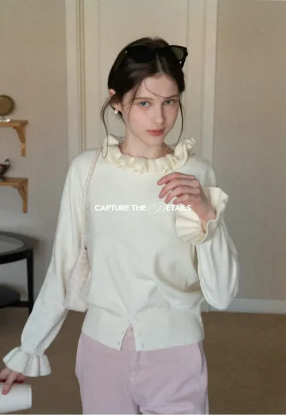 Elegant Ruffle Detail Knit Sweater with Flared Cuffs and Neckline