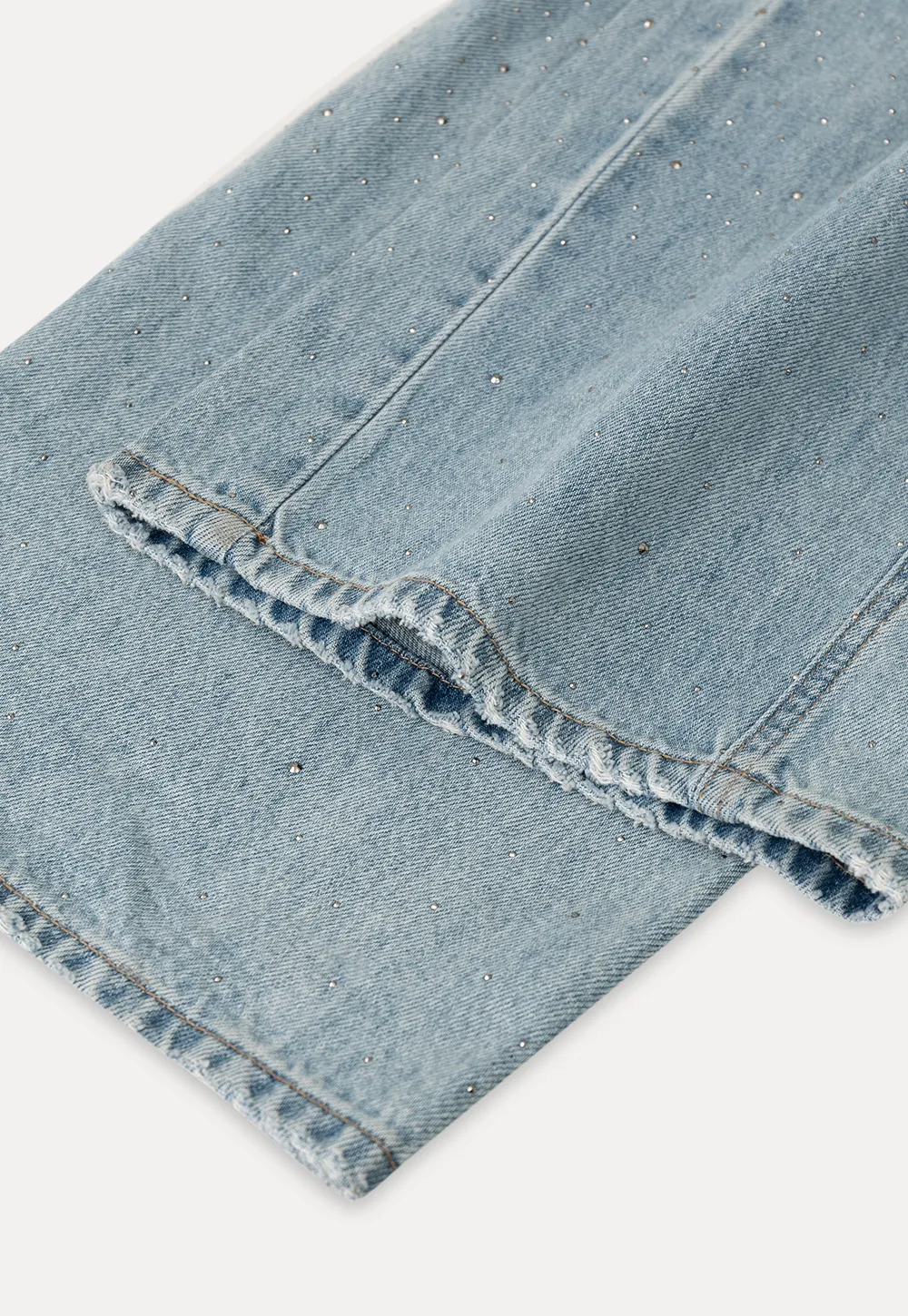Wide leg jeans with subtle dot embellishments