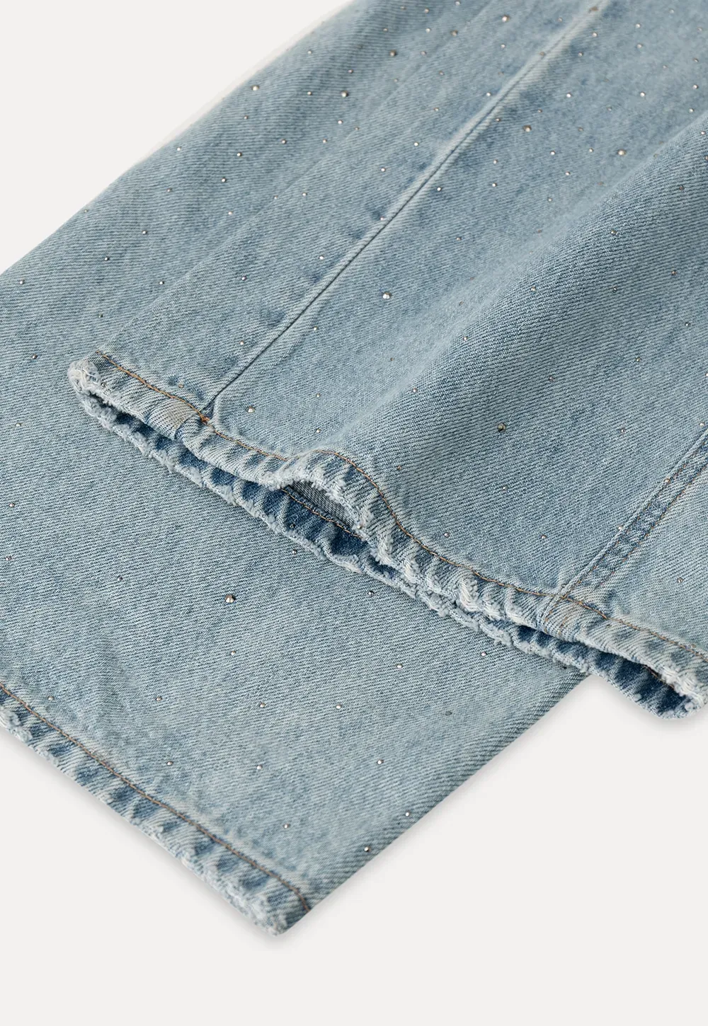 Wide leg jeans with subtle dot embellishments