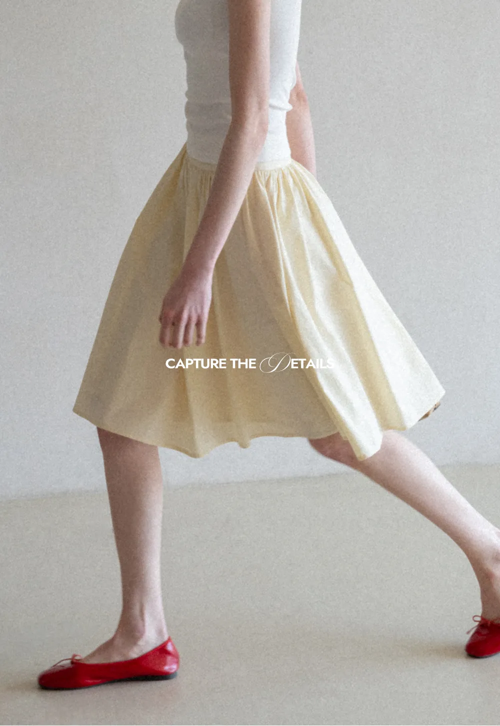 A-line pleated midi skirt with waistband