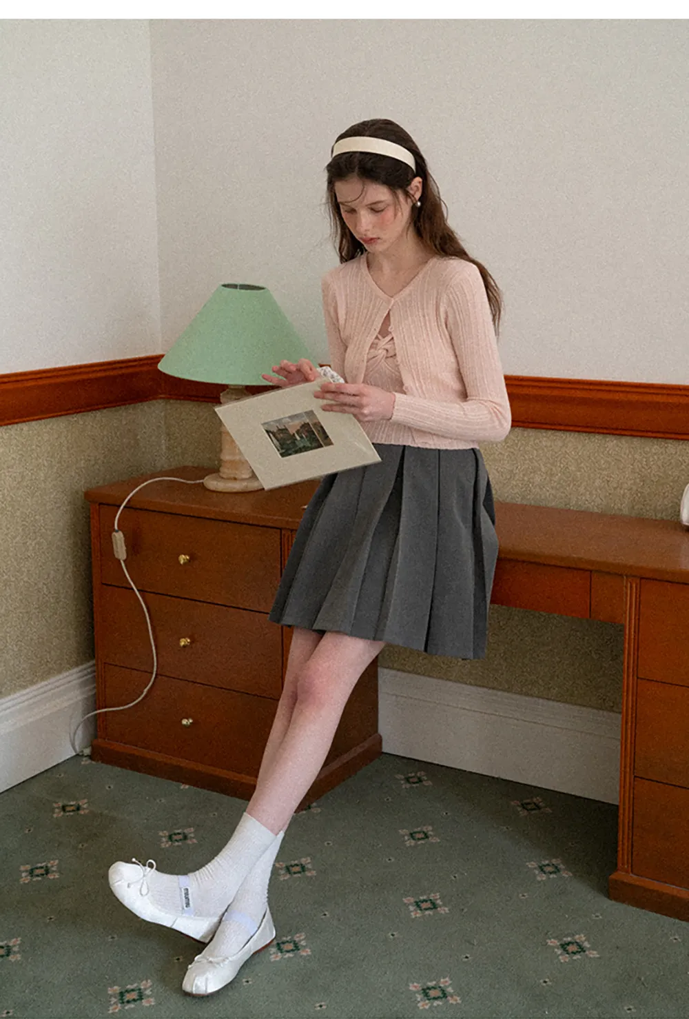 Pleated skirt with front bow detail