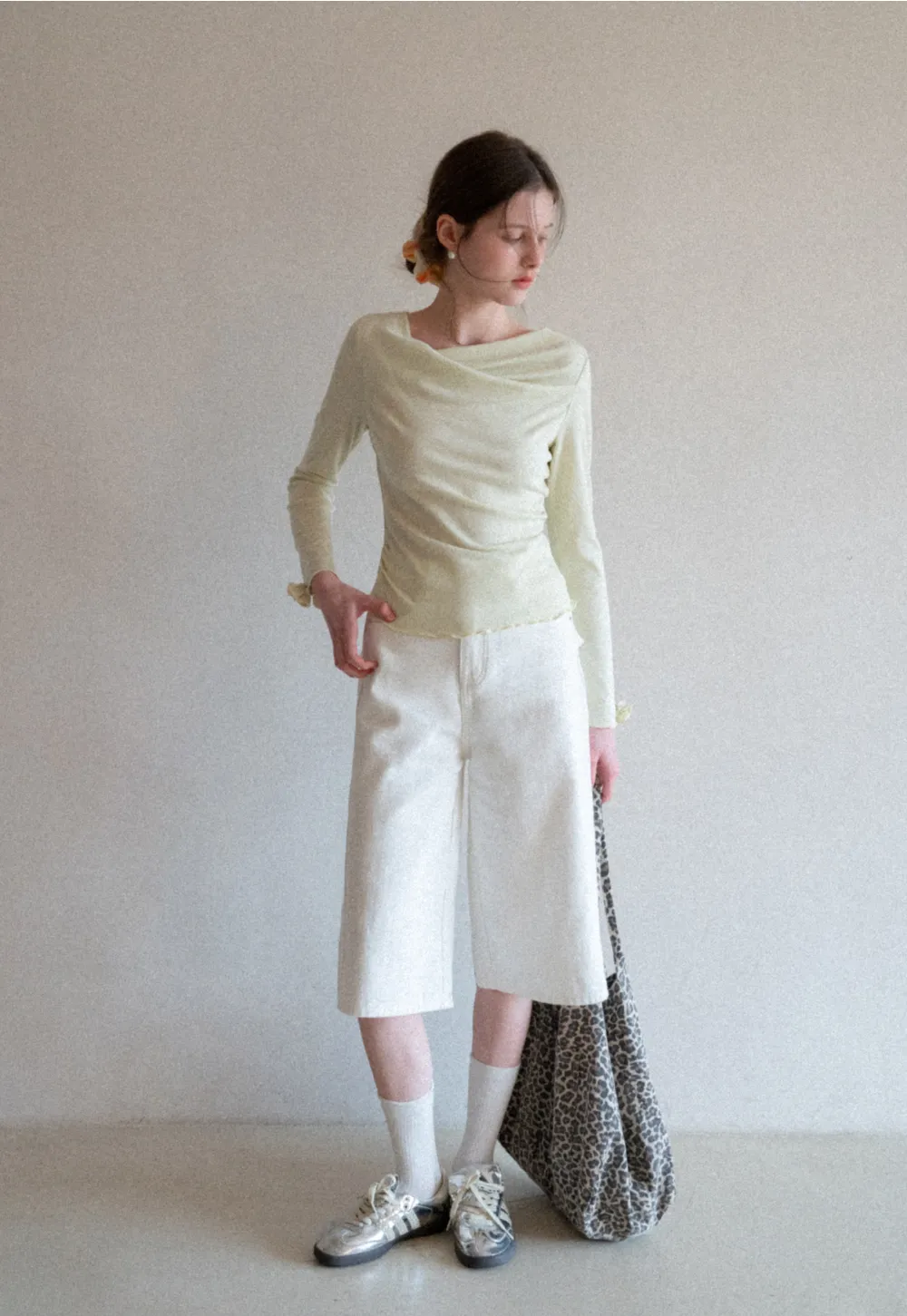 Long sleeve top with ruffled hem and cuffs