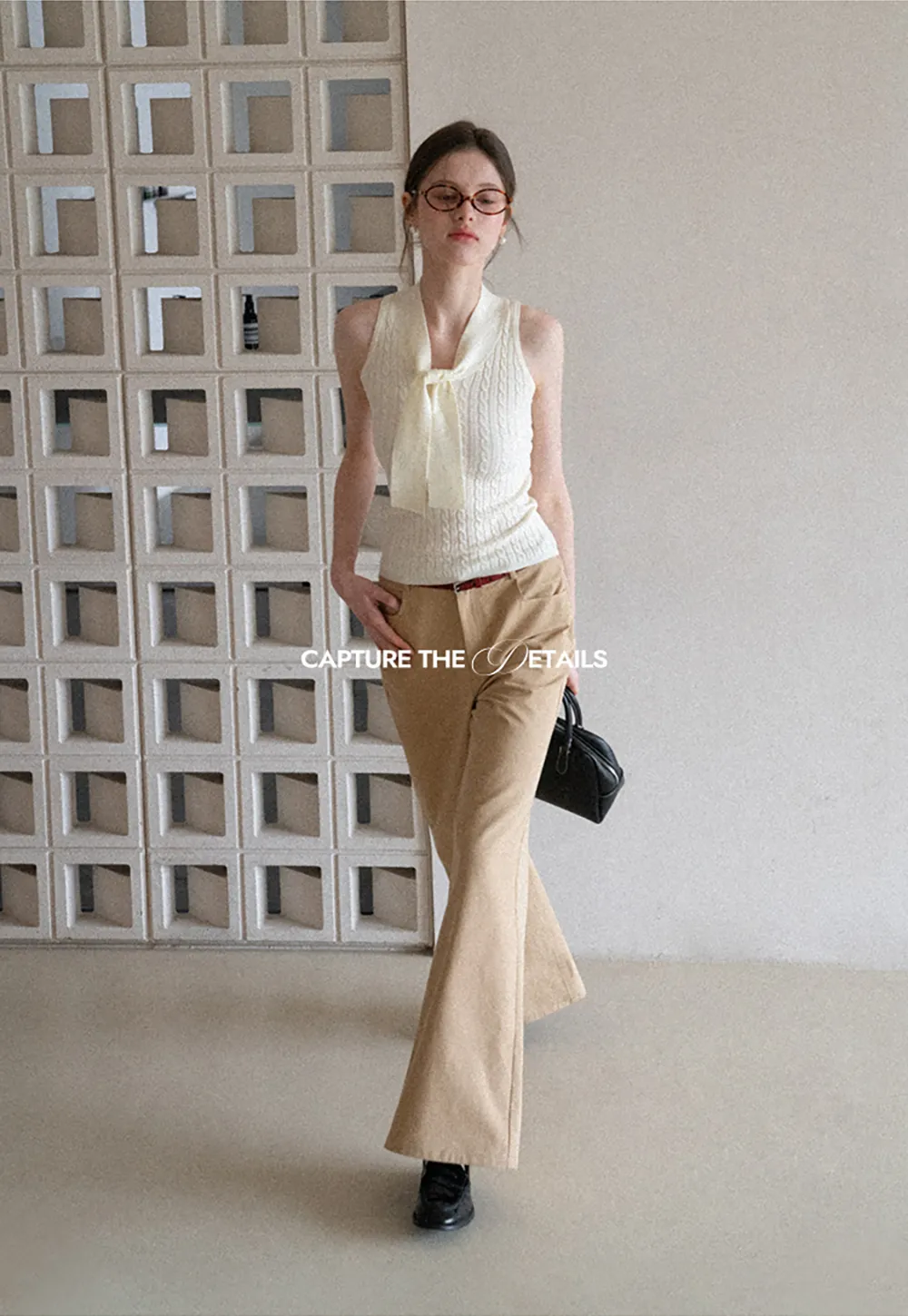 Knit Sleeveless Top with Front Bow Detail