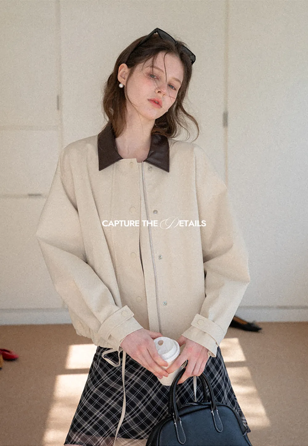 Short jacket with contrast collar and front buttons