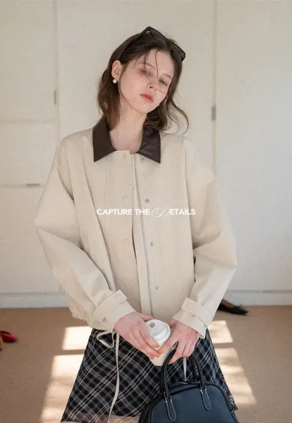 Short jacket with contrast collar and front buttons