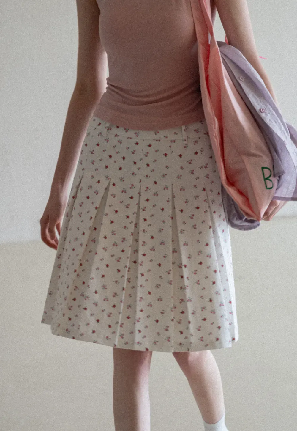 Pleated skirt with floral print