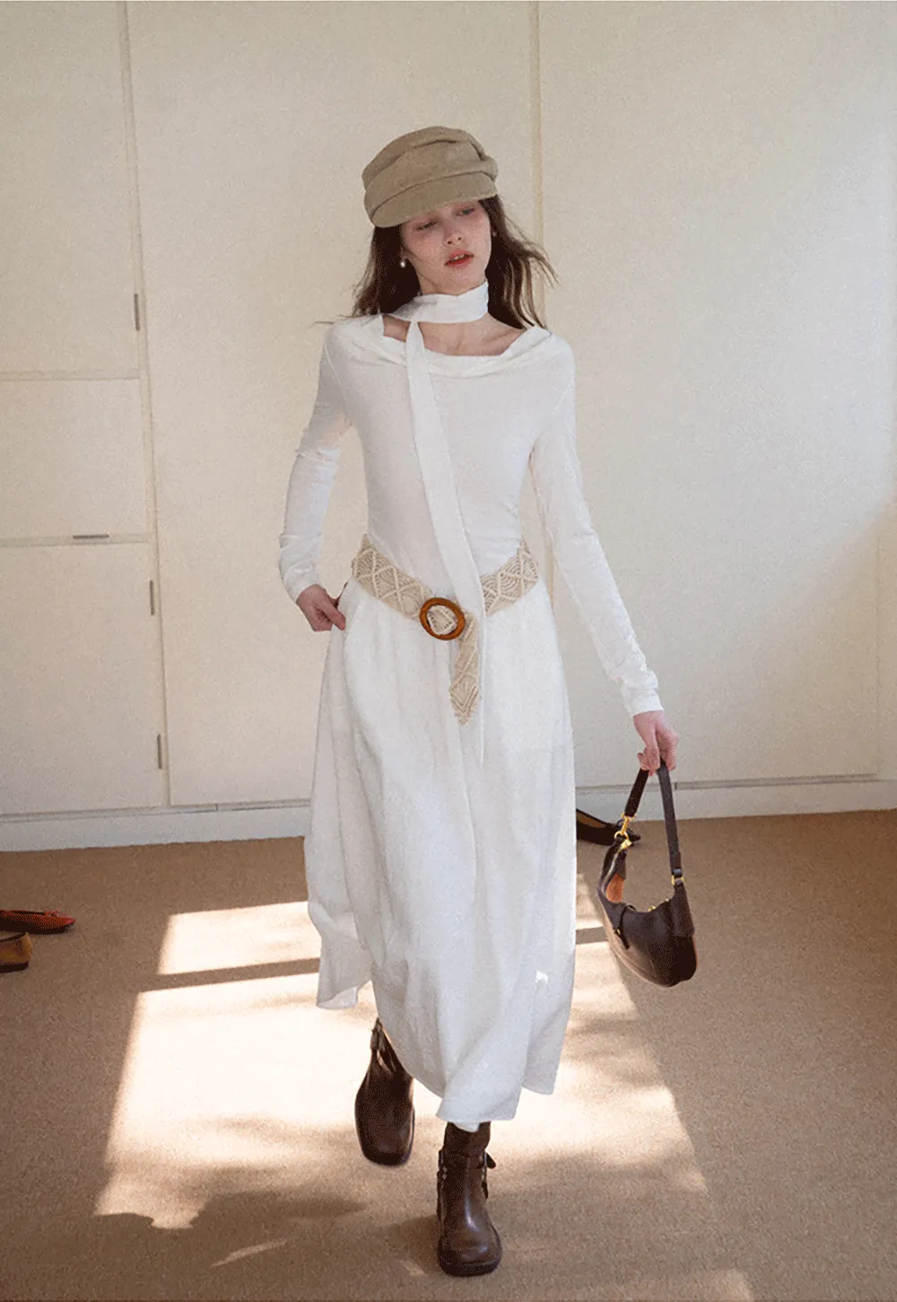 Elegant asymmetrical long sleeve dress with unique belt design