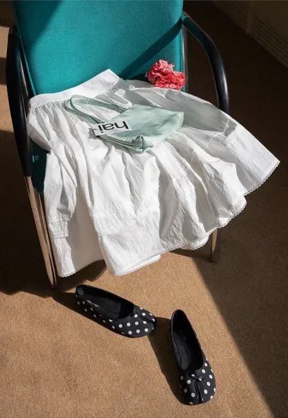 Lightweight pleated midi skirt with elastic waist