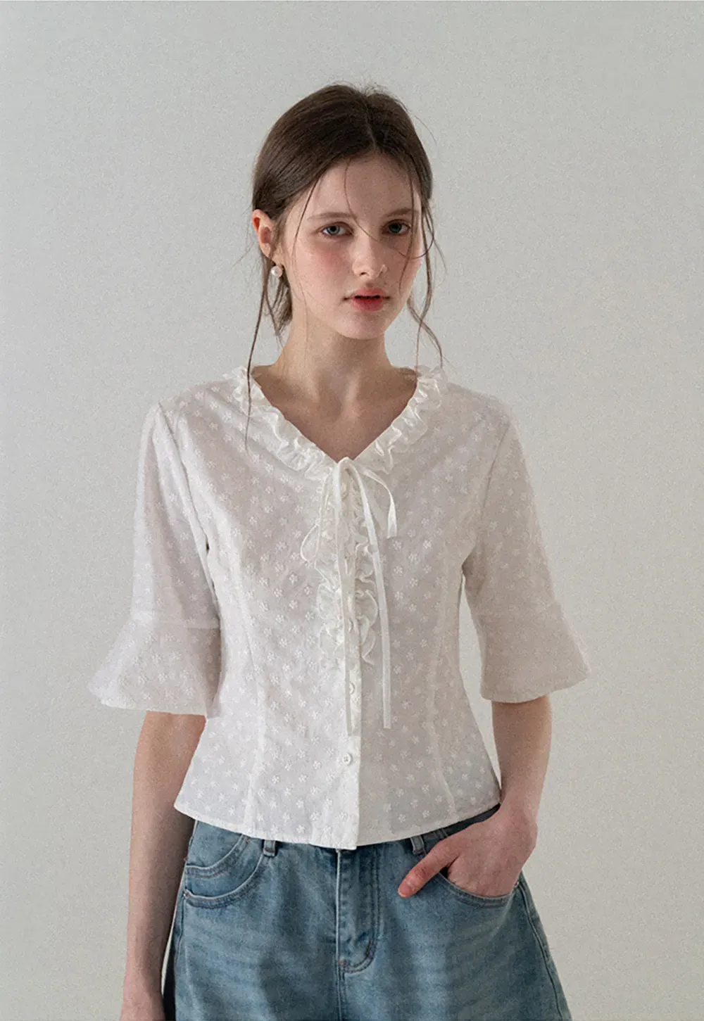 V neck blouse with lace trim and tie front