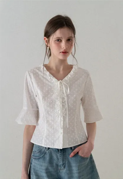 V neck blouse with lace trim and tie front
