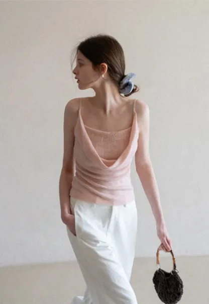 Silk-like tank top with thin straps and draped neckline