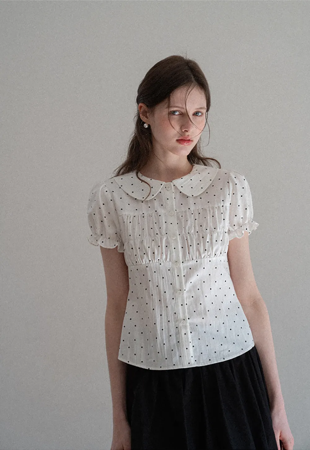 Polka dot shirt with ruffled sleeves and Peter Pan collar