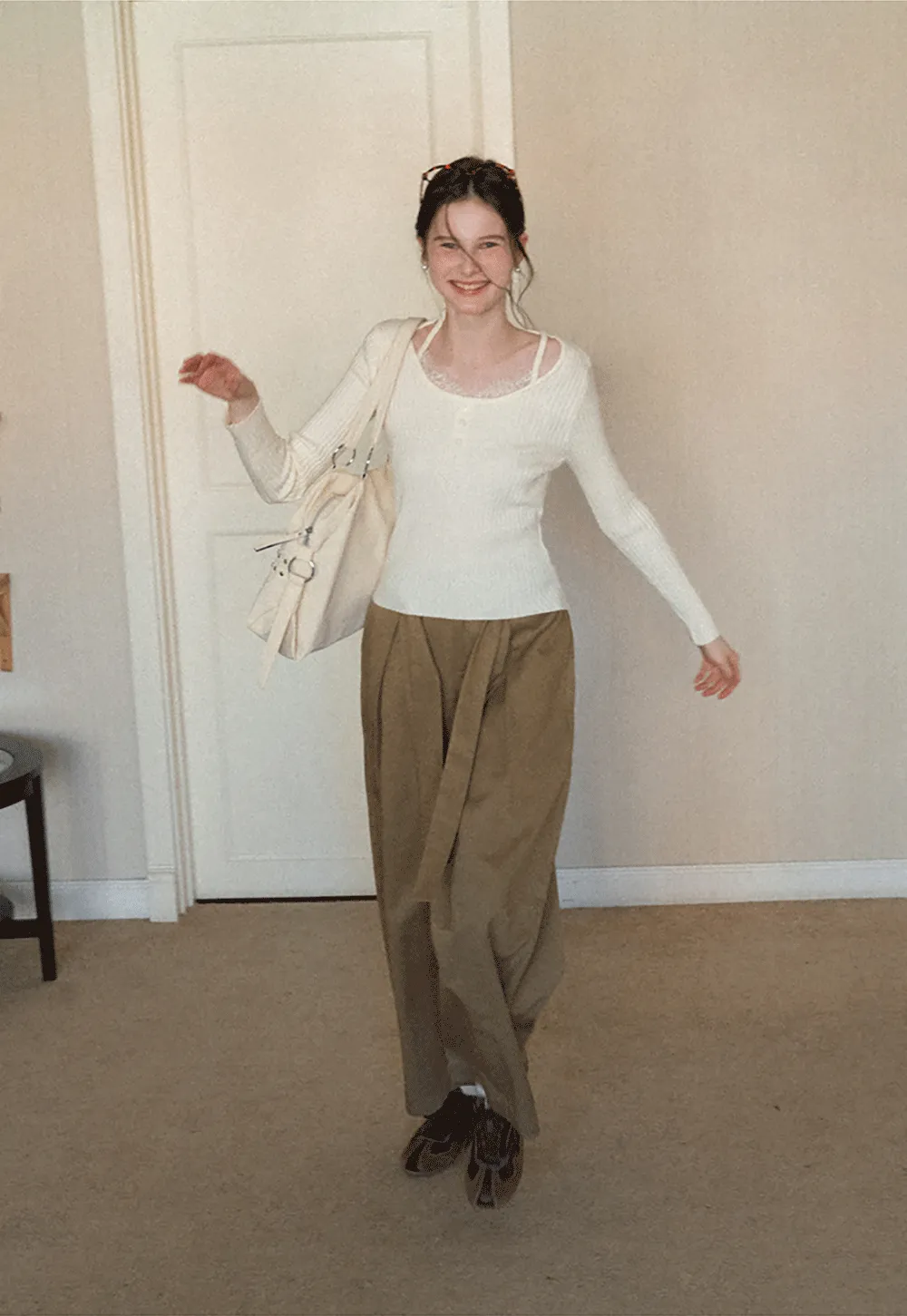 Ribbed knit sweater with boat neck and long sleeves