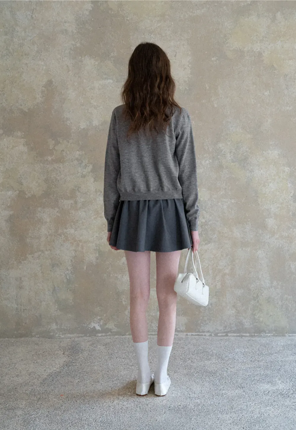 Woolen knit sweater with horse and bow motifs