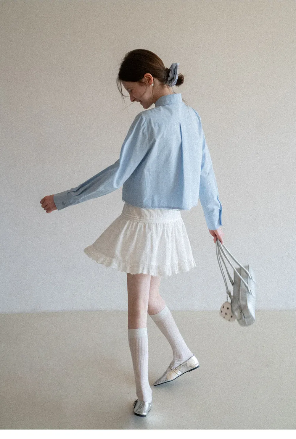 Eyelet Trimmed Tiered Skirt with Ruffled Hem