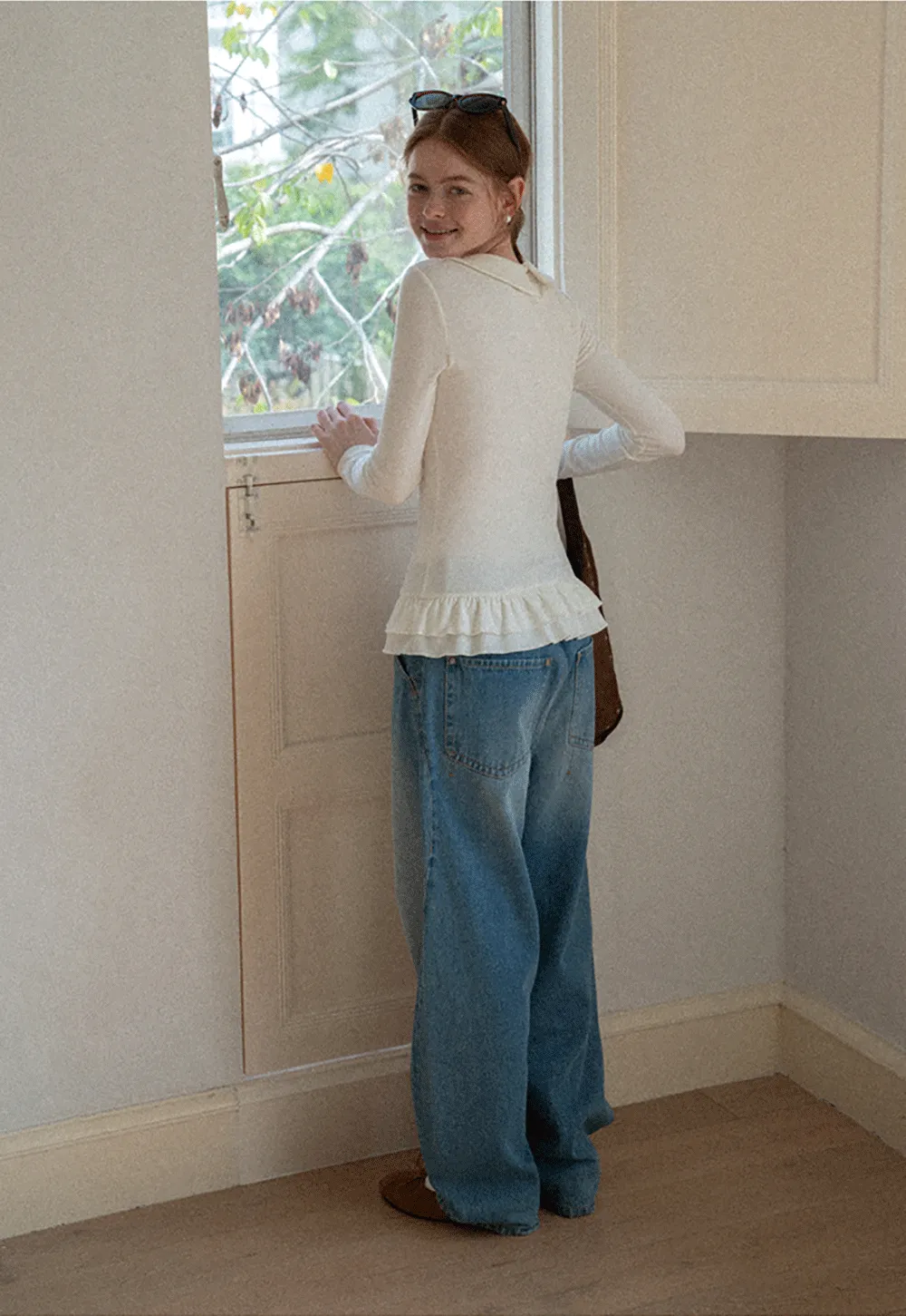 Elegant Long Sleeve Top with Ruffled Hem and Collar Design