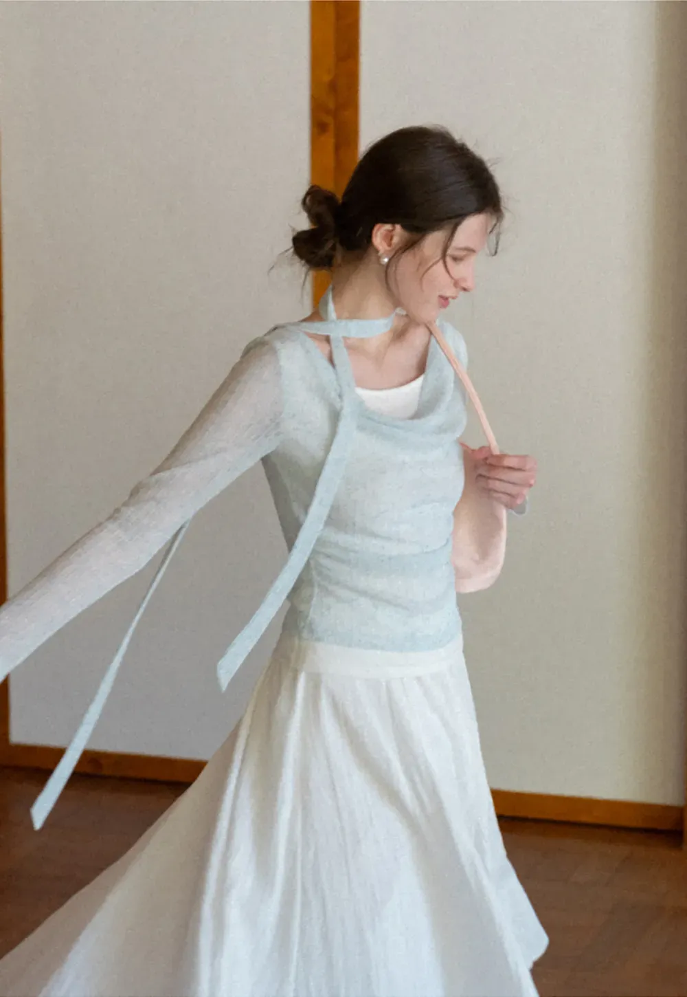 Long sleeve knit top with back tie detail