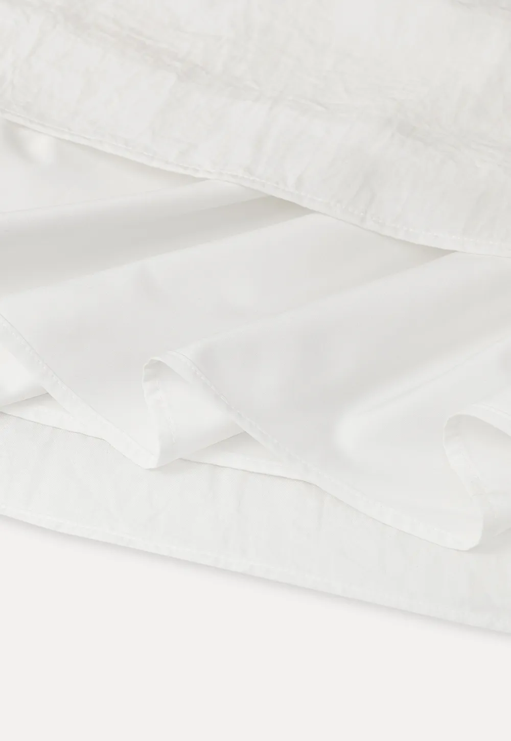 Elegant asymmetrical long sleeve dress with unique belt design