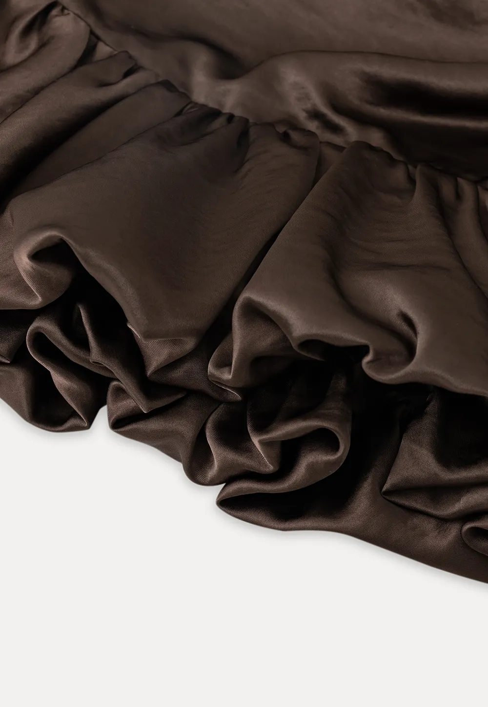 Long sleeve top with ruffled hem and layered design