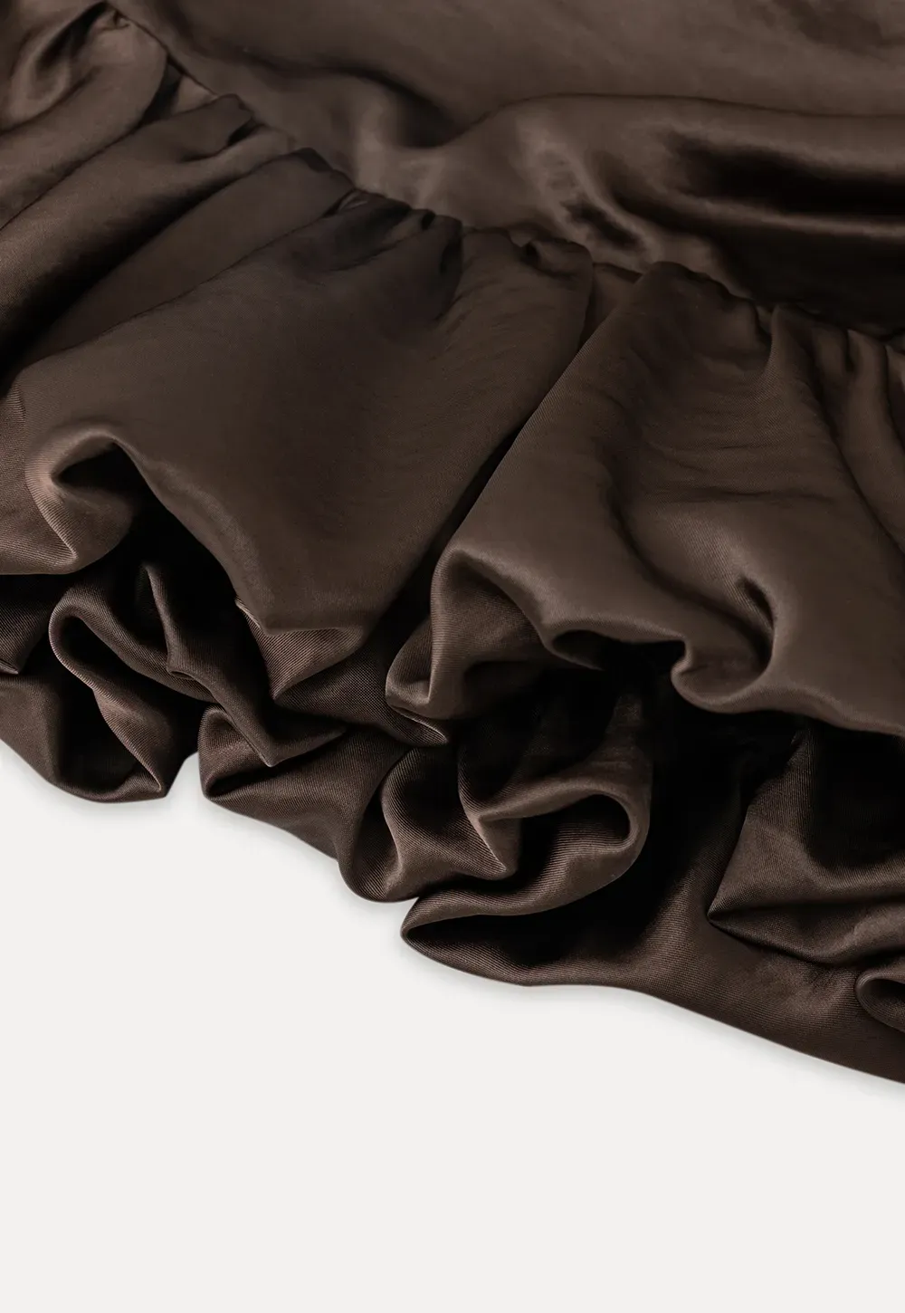 Long sleeve top with ruffled hem and layered design