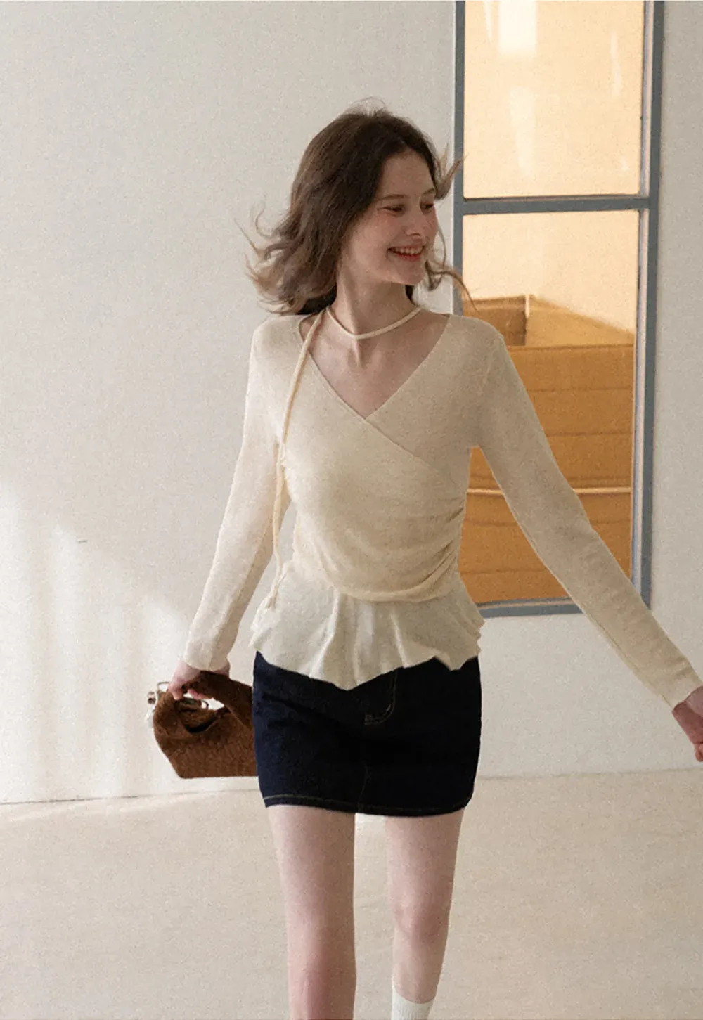 Long sleeve wrap knit sweater with ruched detail