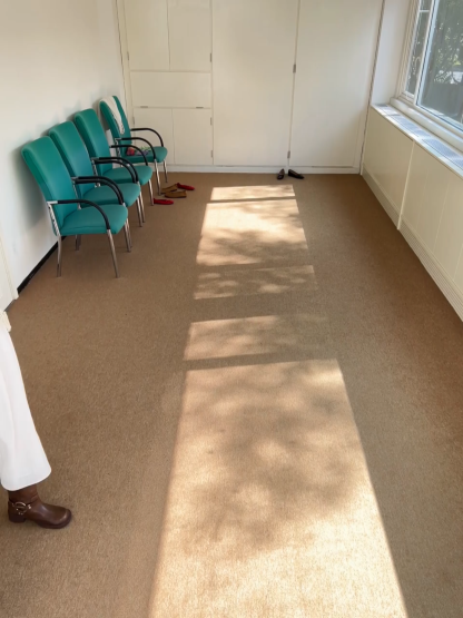 Elegant asymmetrical long sleeve dress with unique belt design