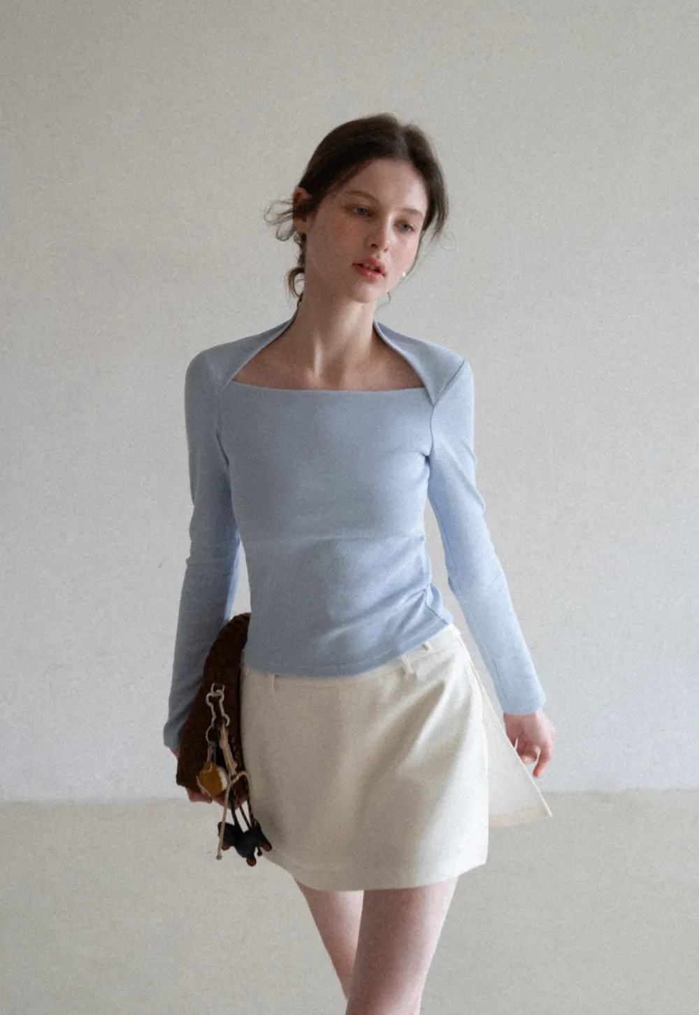 Elegant Pleated Mini Skirt with Asymmetrical Hem