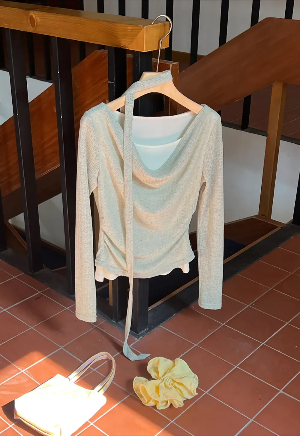 Long sleeve knit top with back tie detail