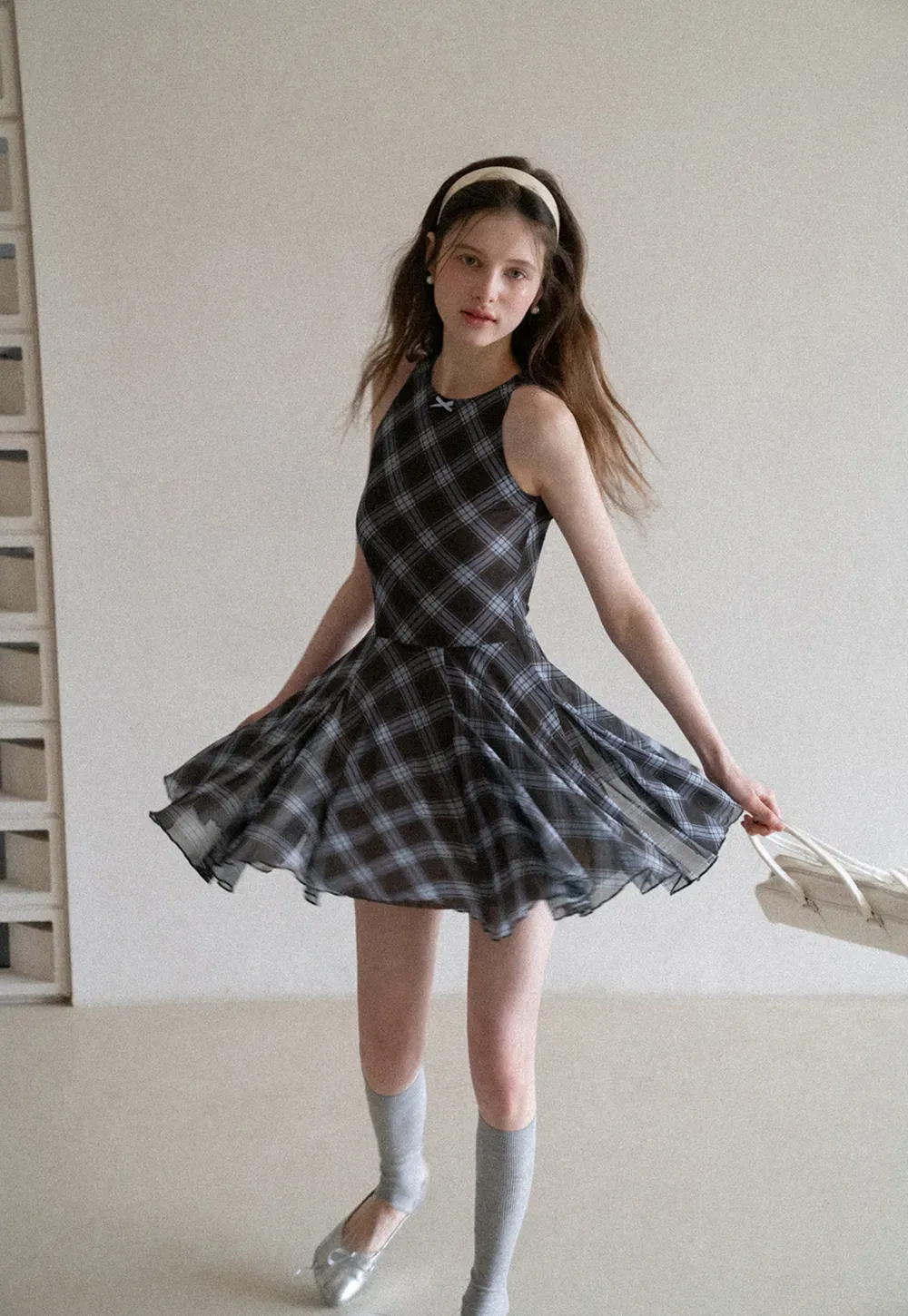 Plaid sleeveless dress with flared skirt