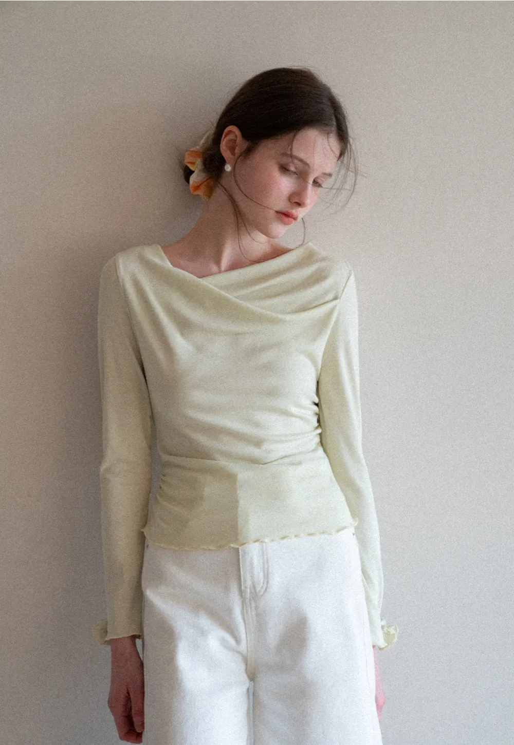 Long sleeve top with ruffled hem and cuffs